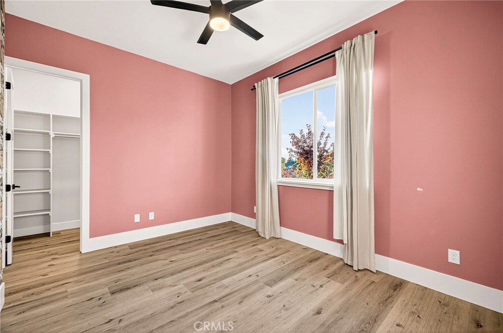 5772 Acorn Ridge Drive Paradise, CA 95969 - Photo 35 of 59 a view of an empty room with window and wooden floor