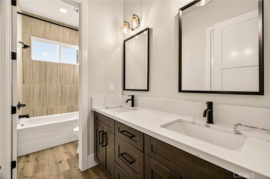 5772 Acorn Ridge Drive Paradise, CA 95969 - Photo 36 of 59 a bathroom with a double vanity sink and a mirror