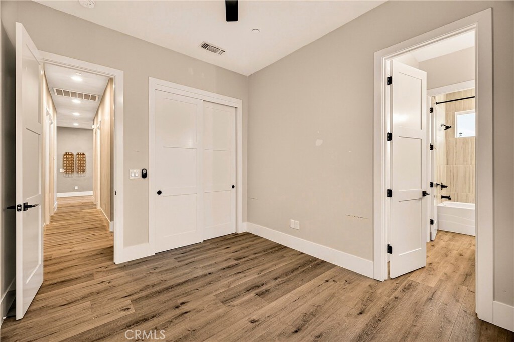 5772 Acorn Ridge Drive Paradise, CA 95969 - Photo 38 of 59 a view of a hallway with wooden floor and closet