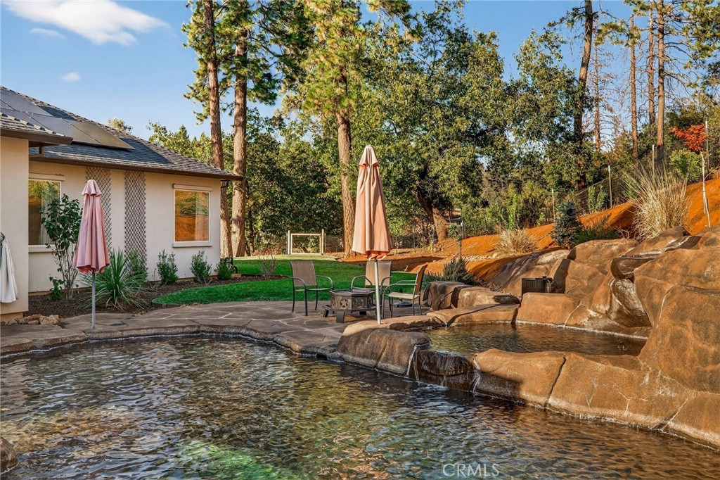 5772 Acorn Ridge Drive Paradise, CA 95969 - Photo 51 of 59 a view of a house with backyard and sitting area