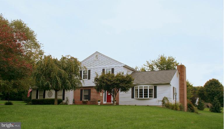 3005 Jackson Ridge Court Phoenix, MD 21131 - Photo 22 of 22 a front view of house with yard and green space