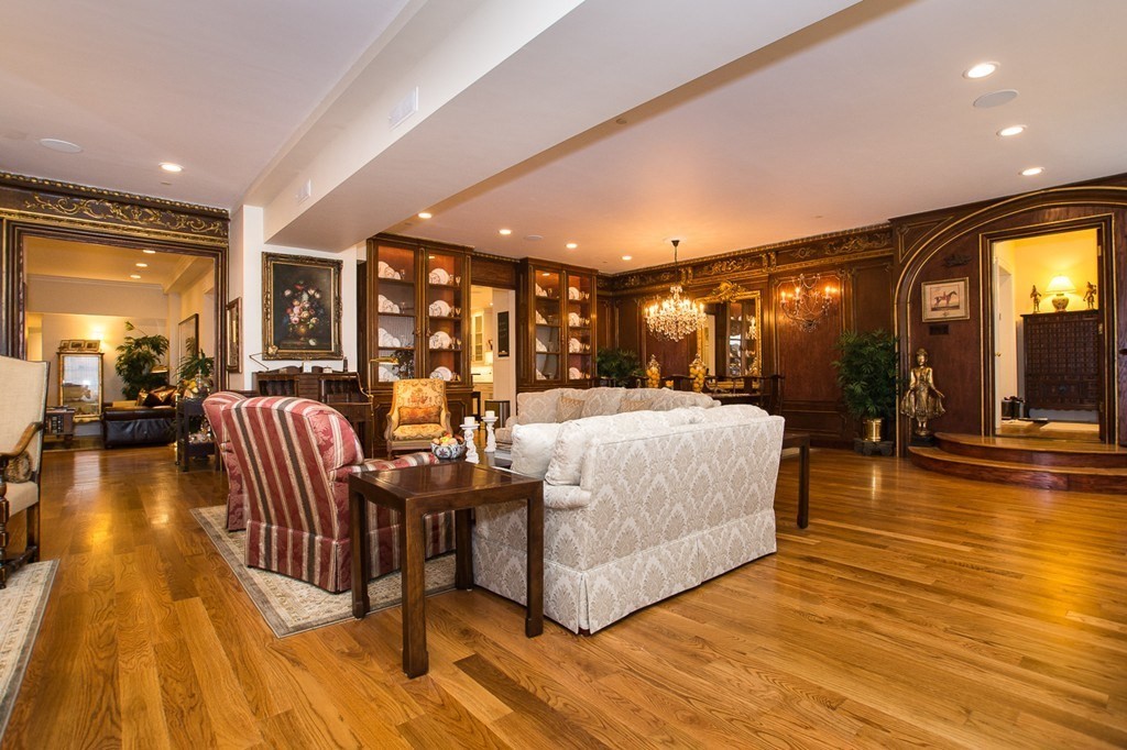 1 Winter Place, Unit 2 Boston, MA 02108 - Photo 9 of 17 a lobby with furniture and wooden floor