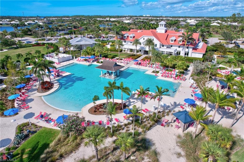 6553 Dominica Drive, Unit 101 Naples, FL 34113 - Photo 1 of 27 an aerial view of a houses and an outdoor space