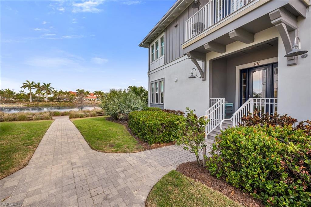 6553 Dominica Drive, Unit 101 Naples, FL 34113 - Photo 18 of 27 a view of a back yard of the house