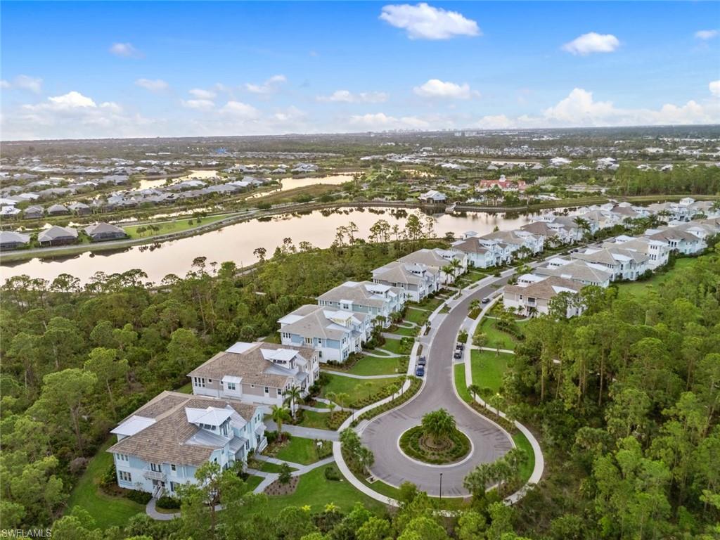 6553 Dominica Drive, Unit 101 Naples, FL 34113 - Photo 2 of 27 an aerial view of a house