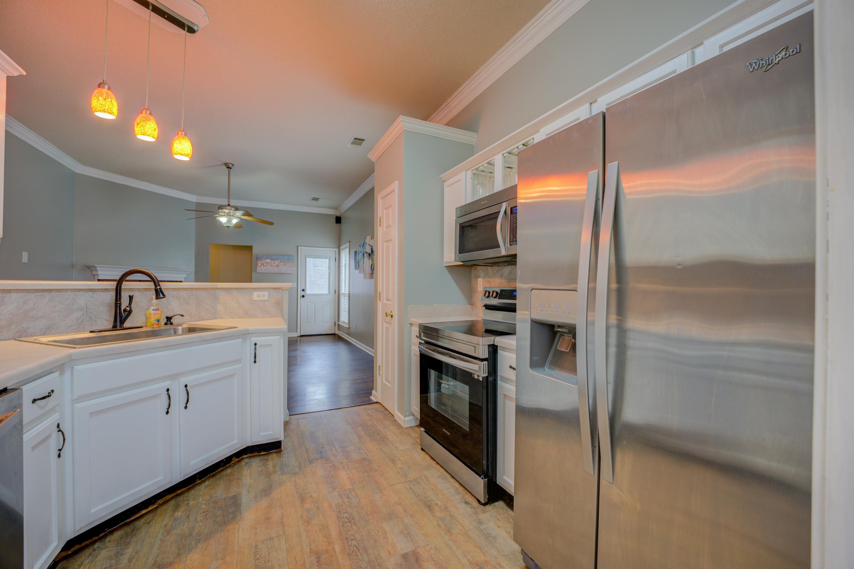 459 North Ericson Road Memphis, TN 38018 - Photo 5 of 27 The kitchen is a showstopper—complete with stainless steel appliances, a tile backsplash, gas cooking, pantry, and a breakfast bar ideal for casual mornings or entertaining.