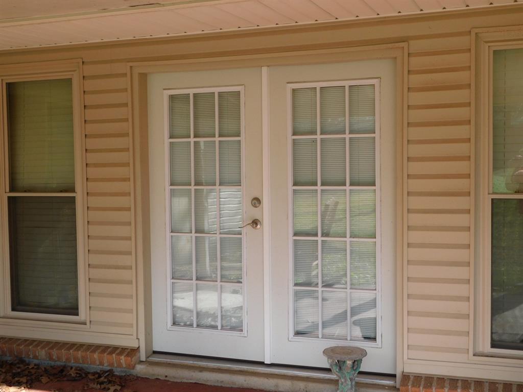 214 Springhill Airport Road Springhill, LA 71075 - Photo 11 of 32 a view of a door of a house