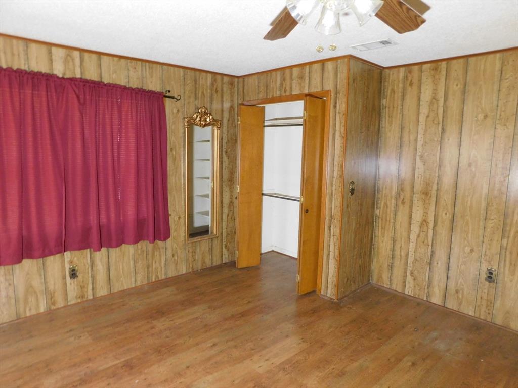 214 Springhill Airport Road Springhill, LA 71075 - Photo 22 of 32 a view of a entryway with wooden walls