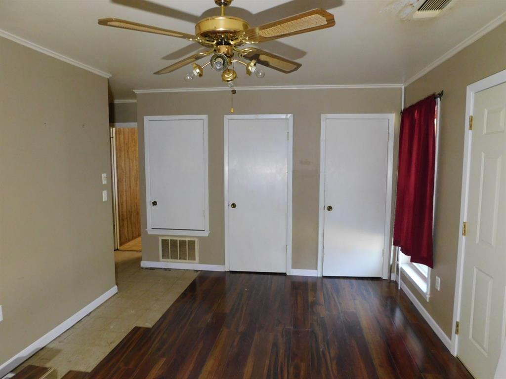 214 Springhill Airport Road Springhill, LA 71075 - Photo 28 of 32 a view of hallway with wooden floor