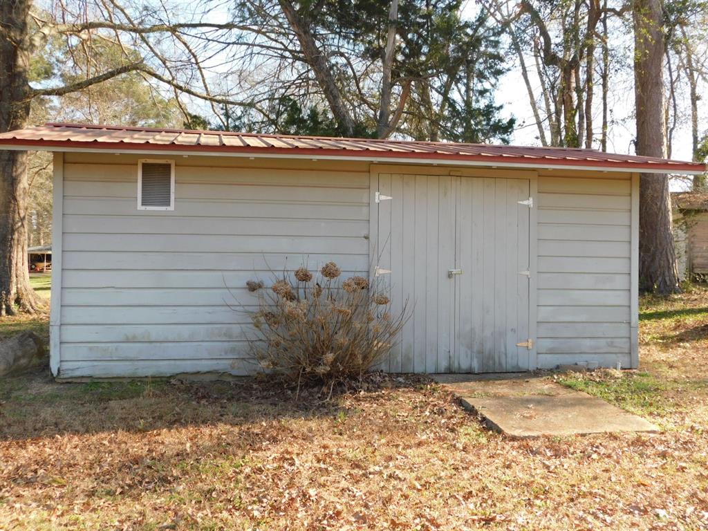 214 Springhill Airport Road Springhill, LA 71075 - Photo 8 of 32 a backyard of a house