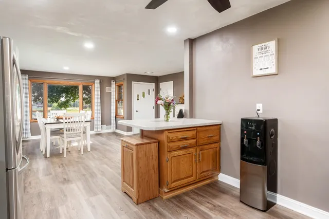 a kitchen with stainless steel appliances granite countertop a stove and a sink