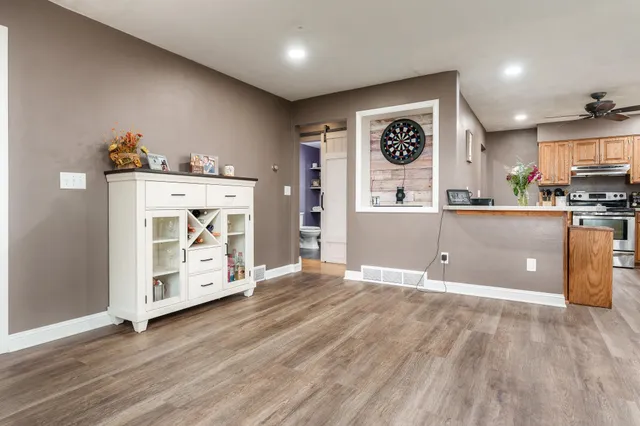 a kitchen with a cabinets and appliances