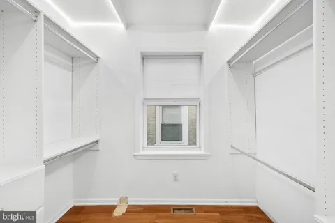 a view of a room that has a window in it