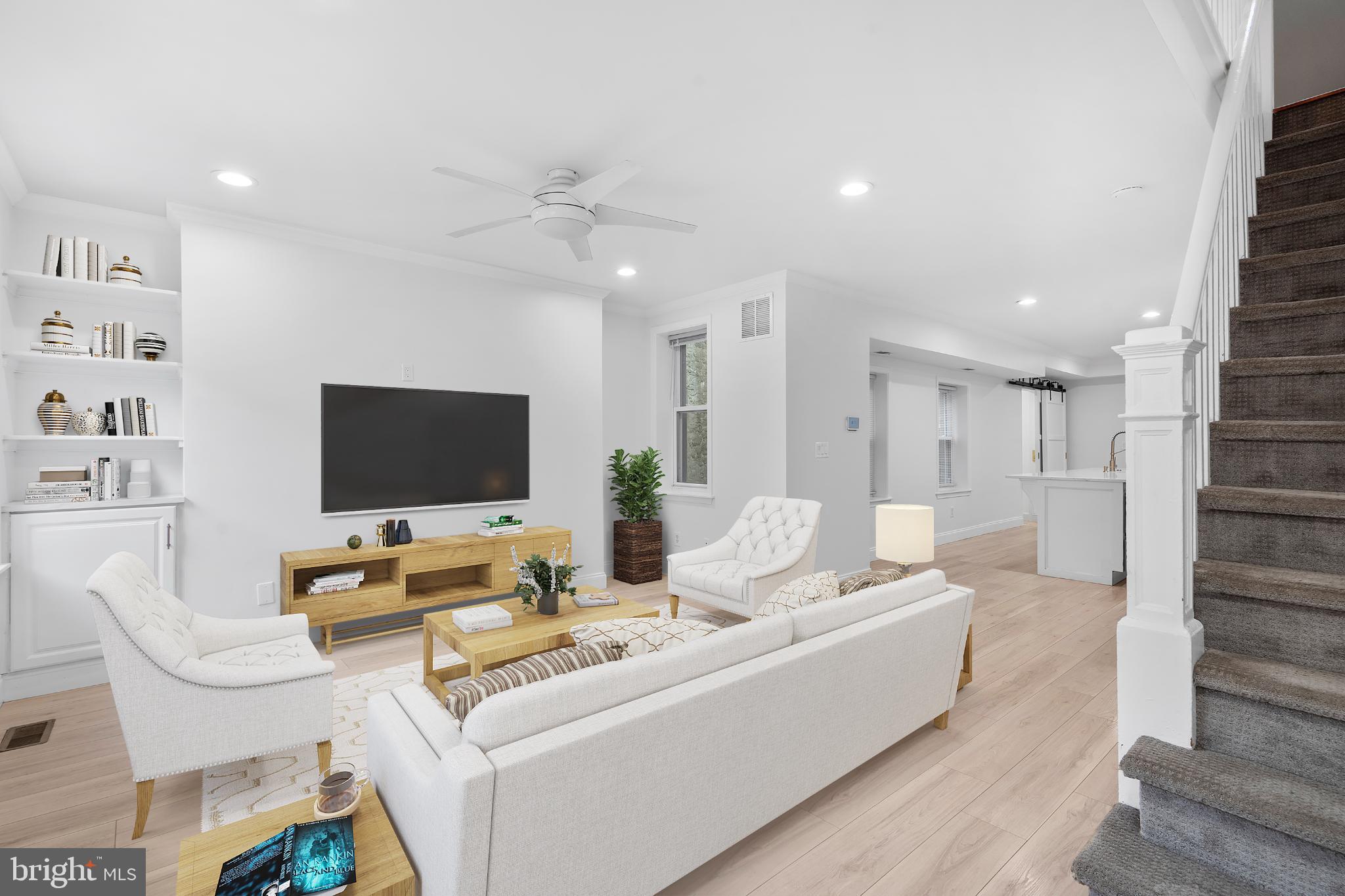 944 North Randolph Street Philadelphia, PA 19123 - Photo 3 of 26 a living room with furniture and a flat screen tv