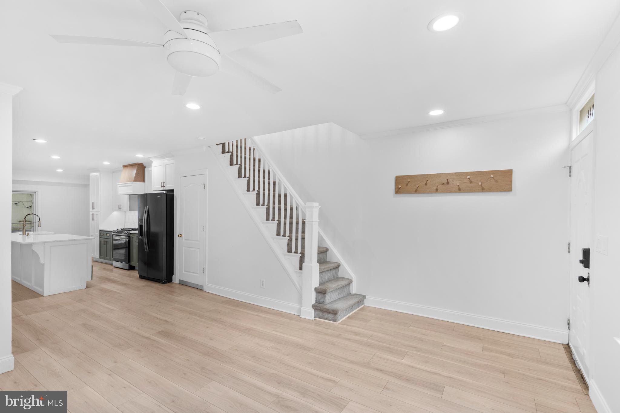 944 North Randolph Street Philadelphia, PA 19123 - Photo 5 of 26 a view of a room with a ceiling fan and window