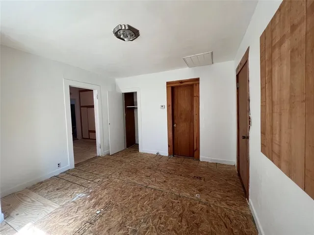 a view of a room with closet and bathroom