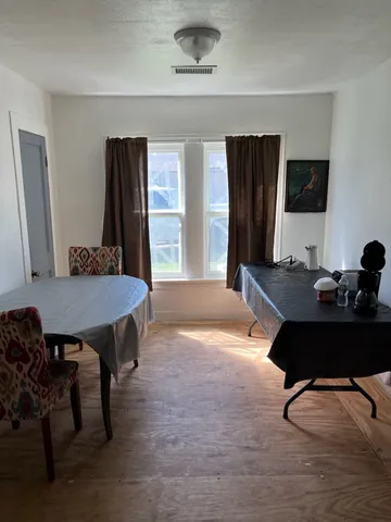 a workspace with furniture and window