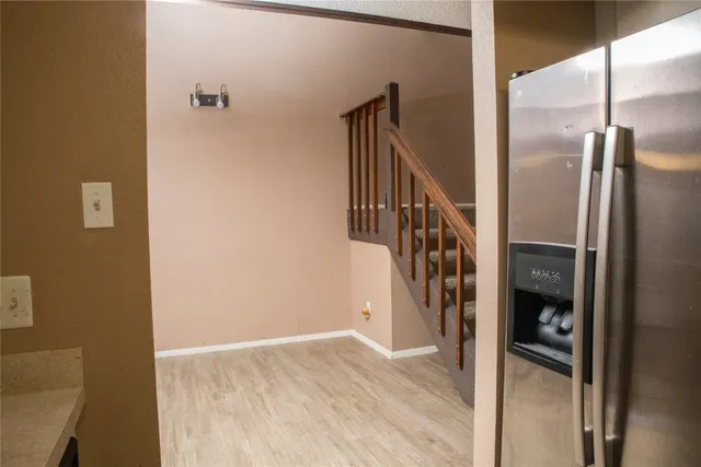 a view of hallway with stairs