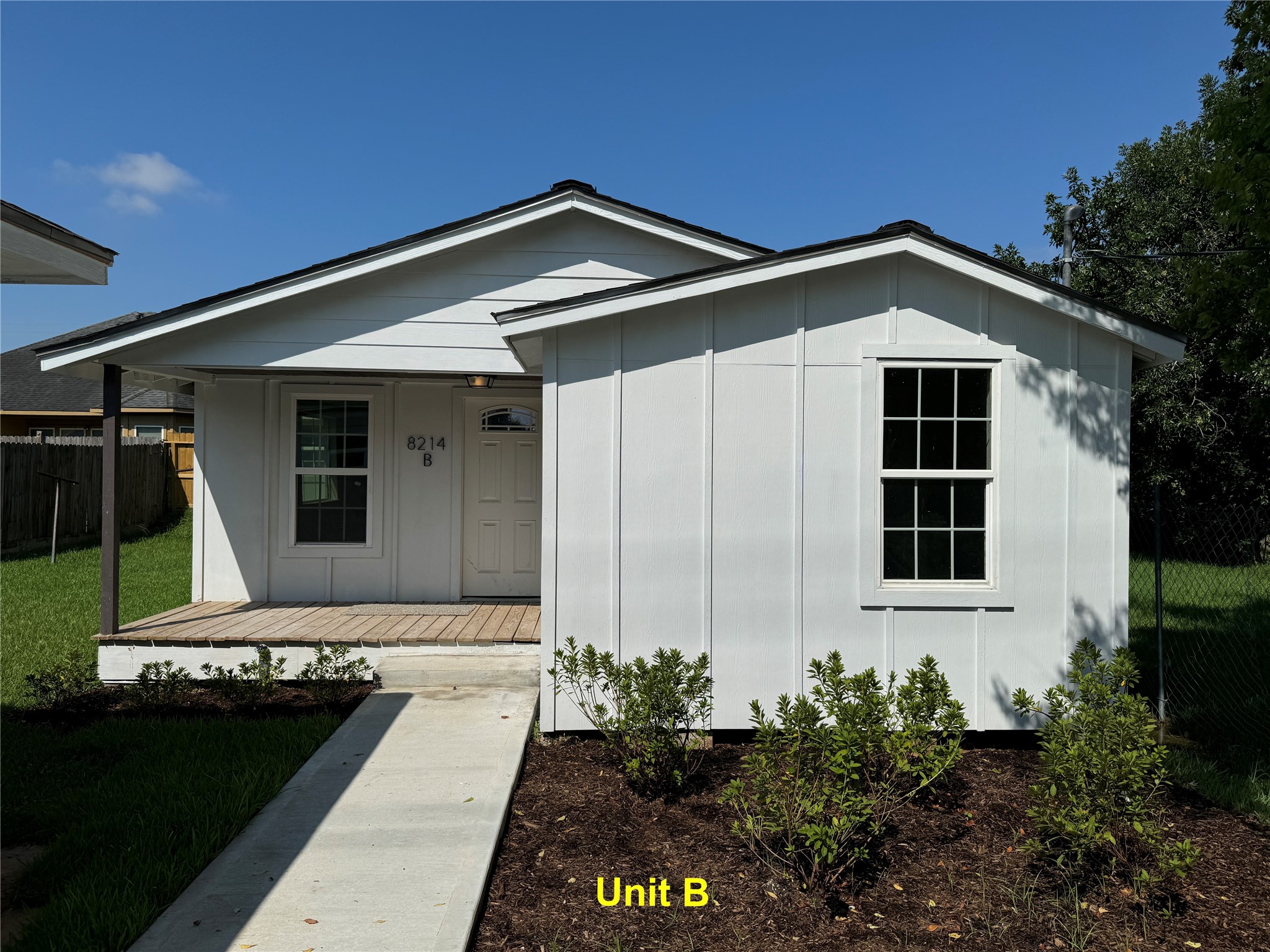 8214 Livingston Street, Unit A Houston, TX 77051 - Photo 8 of 17 a front view of house with yard