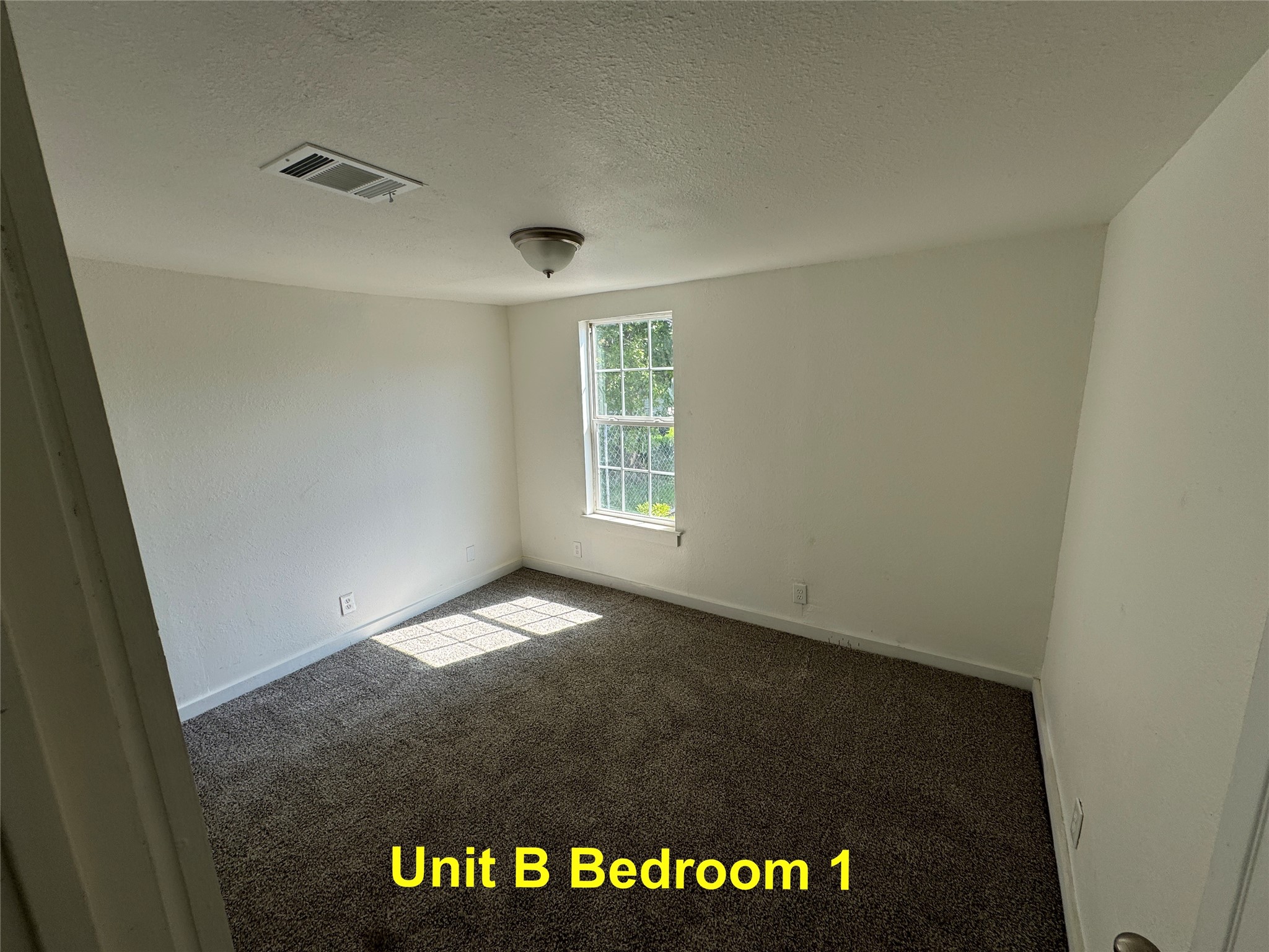 8214 Livingston Street, Unit A Houston, TX 77051 - Photo 9 of 17 a view of an empty room