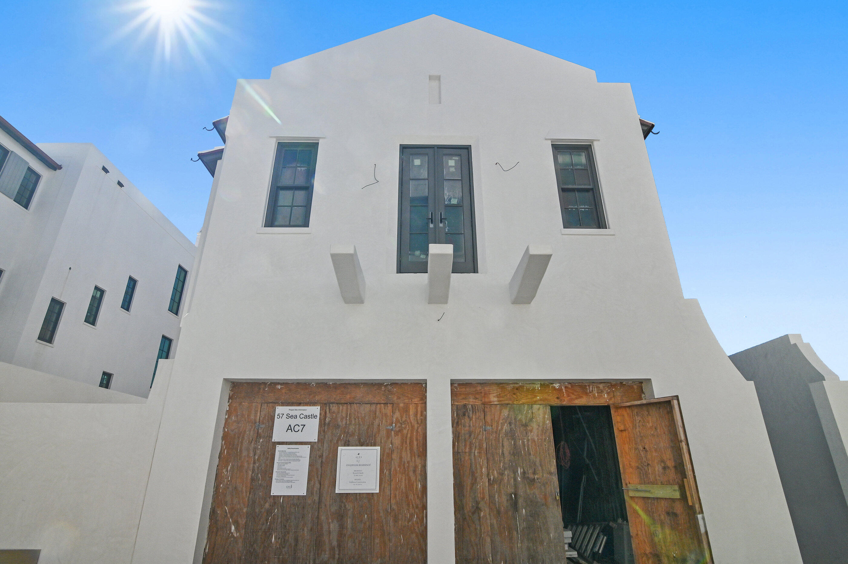 57 Sea Castle Alley Inlet Beach Inlet Beach, FL 32461 - Photo 11 of 12 a front view of a house with entryway
