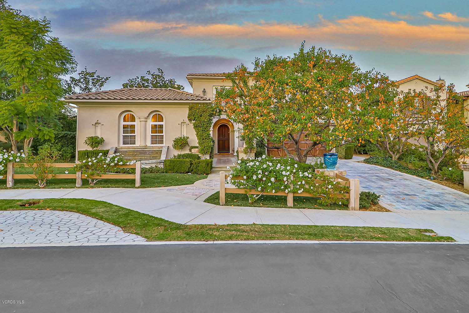 a house view with a garden space