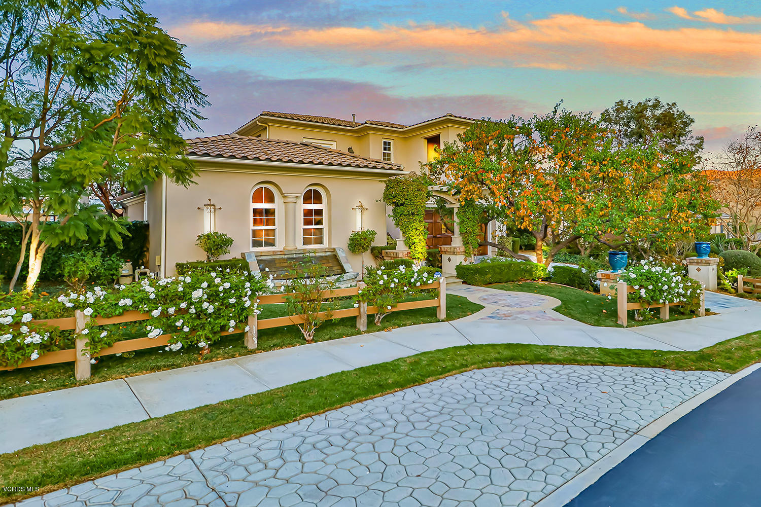 457 Vineyard Drive Simi Valley, CA 93065 - Photo 2 of 65 a front view of a house with a yard