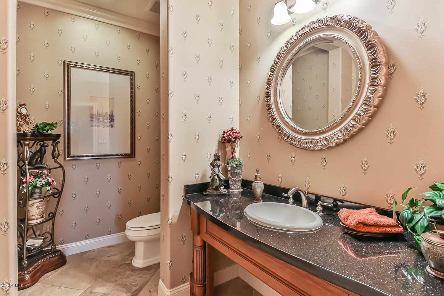 457 Vineyard Drive Simi Valley, CA 93065 - Photo 25 of 65 a bathroom with a granite countertop sink and a mirror