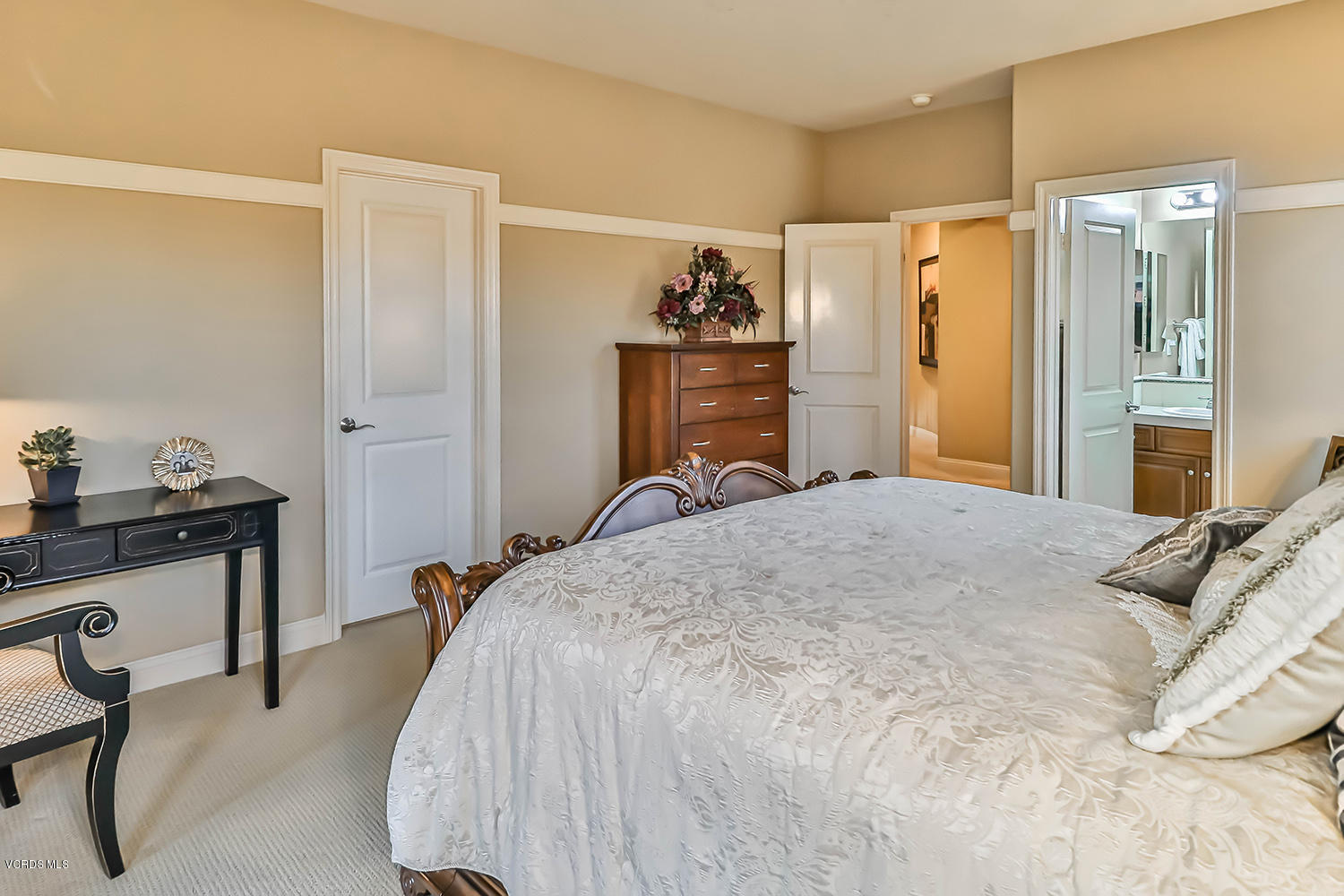 457 Vineyard Drive Simi Valley, CA 93065 - Photo 27 of 65 a bedroom with a bed and a dresser in it