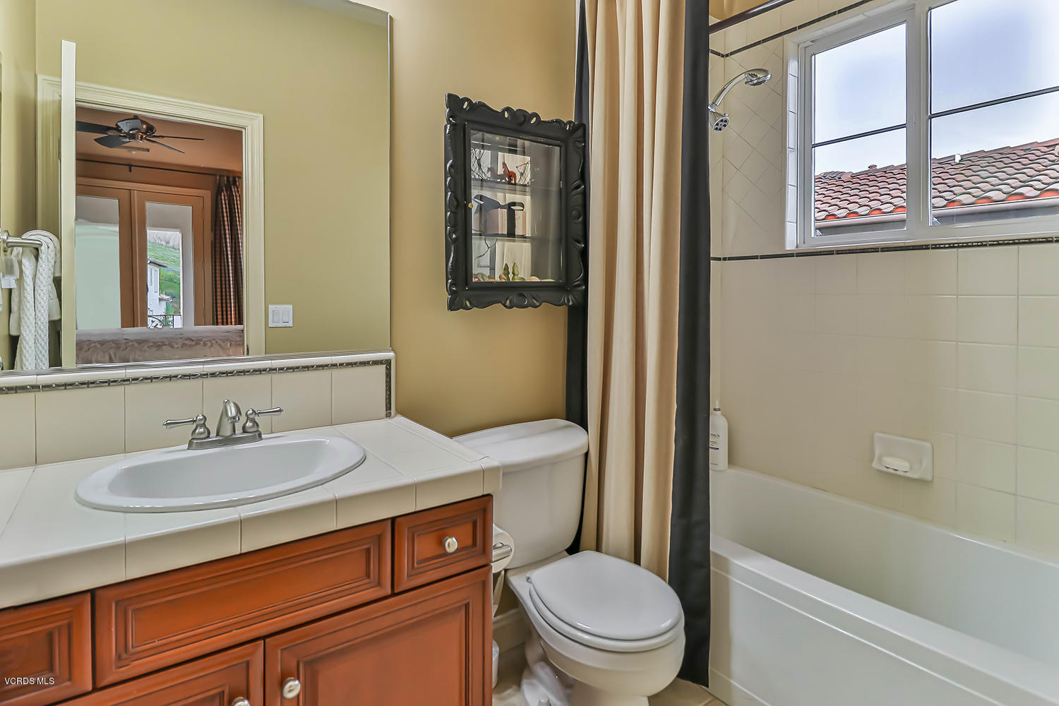 457 Vineyard Drive Simi Valley, CA 93065 - Photo 30 of 65 a bathroom with a sink a toilet and shower