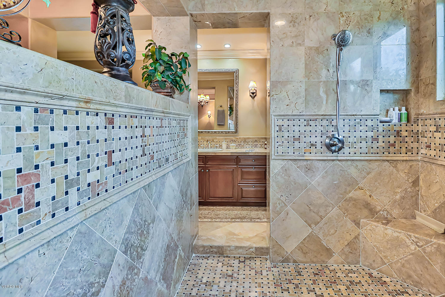 457 Vineyard Drive Simi Valley, CA 93065 - Photo 46 of 65 a bathroom with a granite countertop shower a sink and a mirror