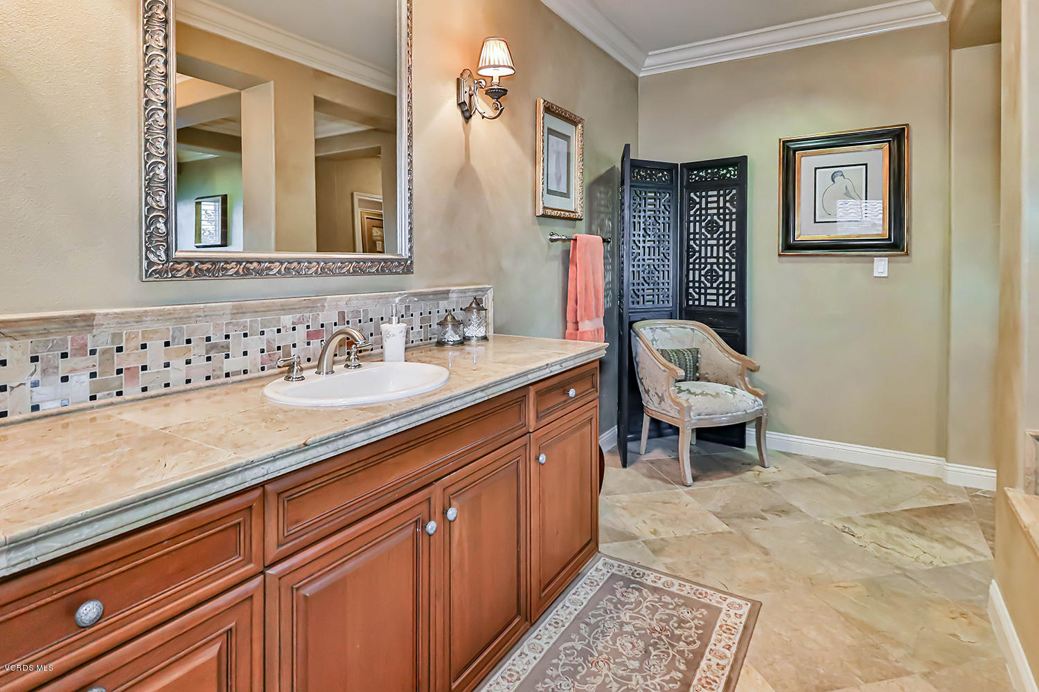 457 Vineyard Drive Simi Valley, CA 93065 - Photo 47 of 65 a spacious bathroom with a sink and a mirror