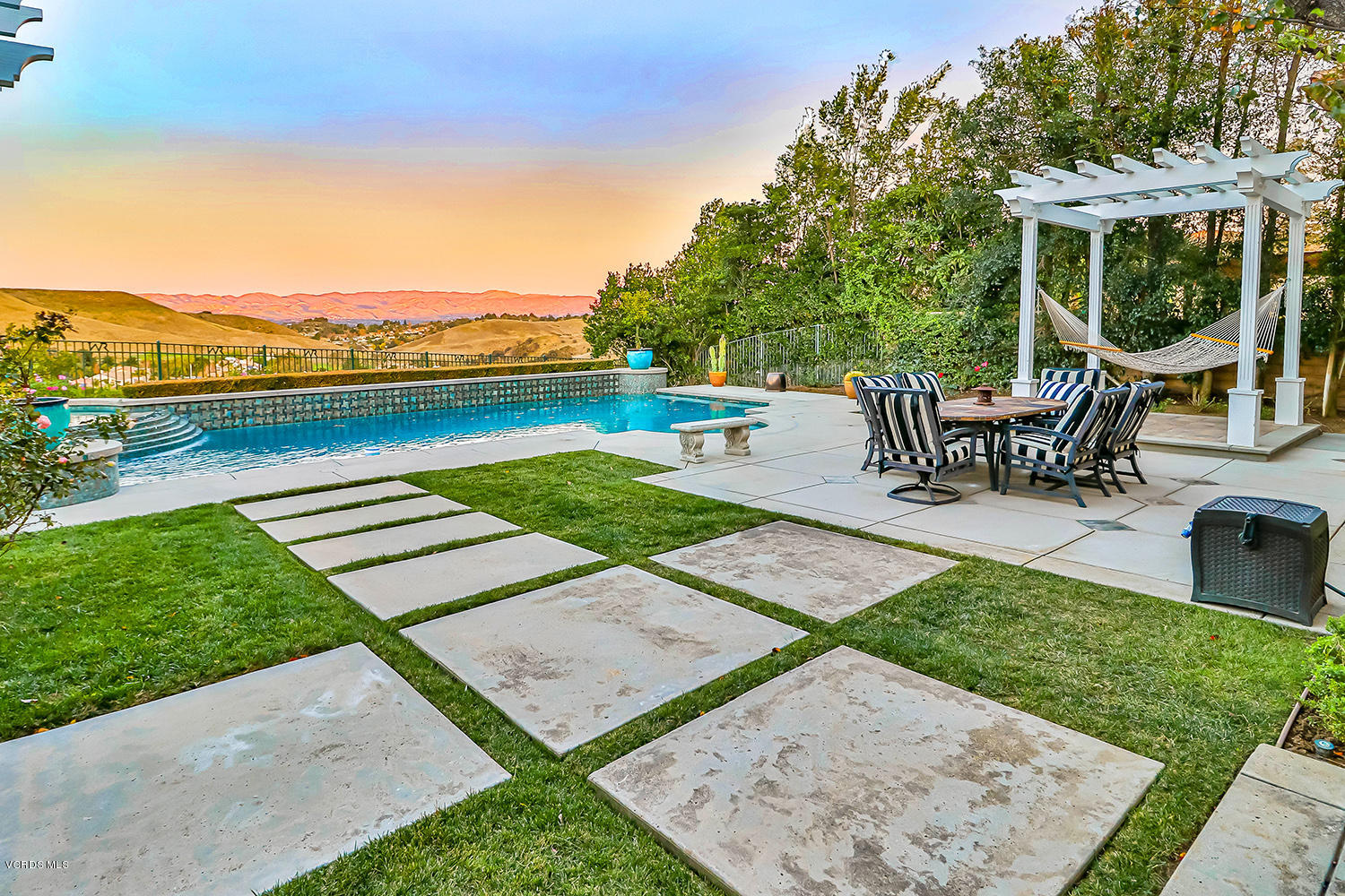 457 Vineyard Drive Simi Valley, CA 93065 - Photo 50 of 65 swimming pool view with a seating space and a garden
