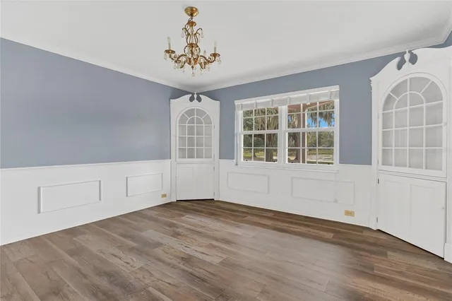 a view of a hallway with staircase