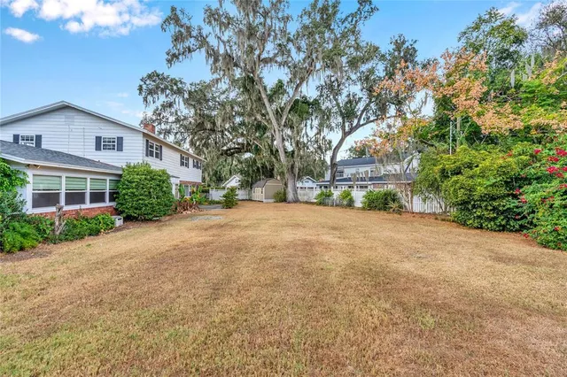 a view of a yard in front of a house