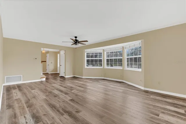 an empty room with windows