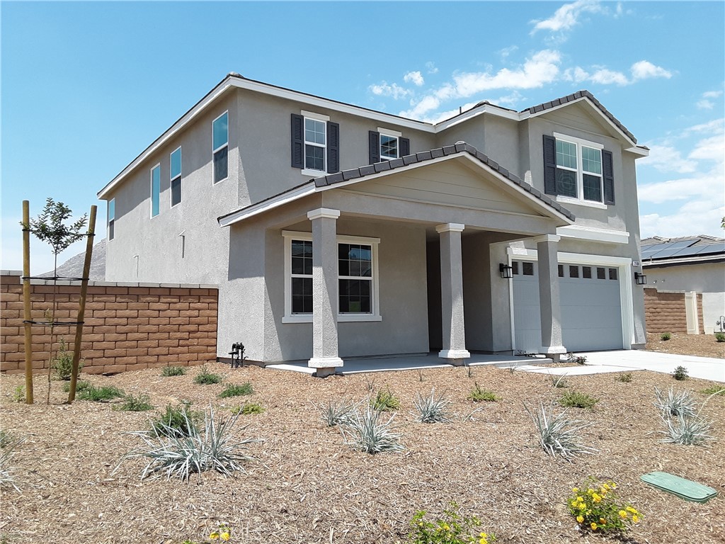 21108 Bison Mesa Road Riverside, CA 92507 - Photo 2 of 45 a front view of a house with a yard