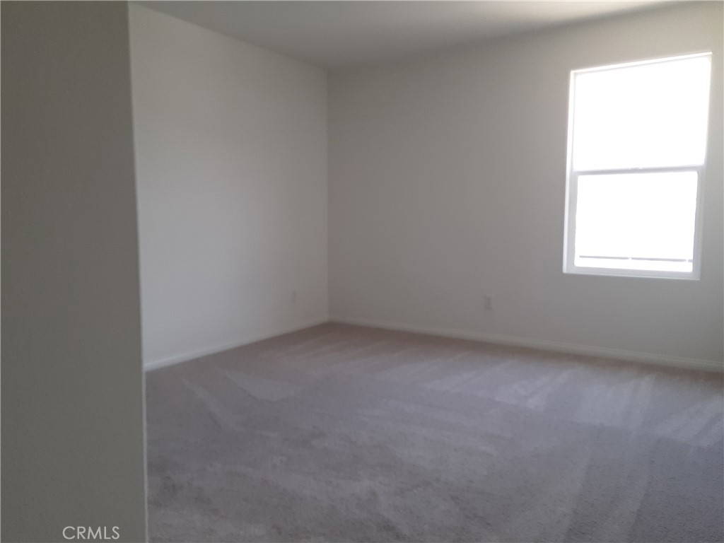21108 Bison Mesa Road Riverside, CA 92507 - Photo 23 of 45 an empty room with a window
