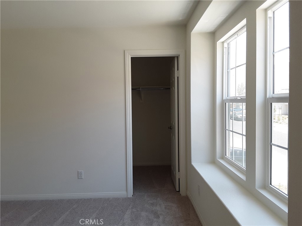 21108 Bison Mesa Road Riverside, CA 92507 - Photo 27 of 45 a view of an empty room with a window