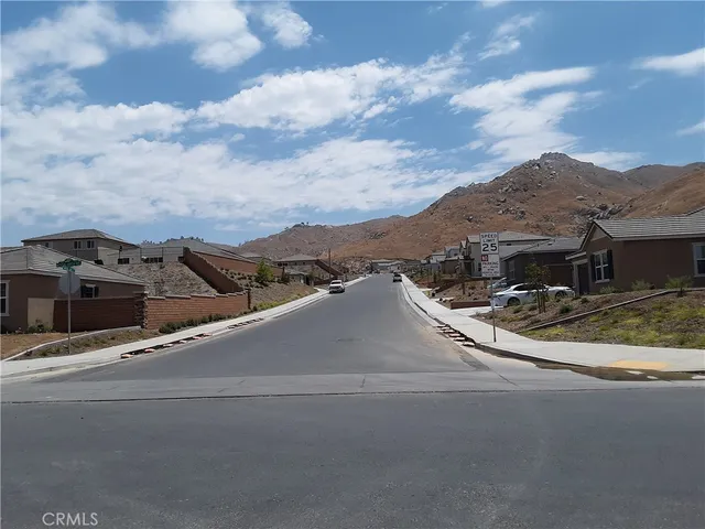front view of a house with a street