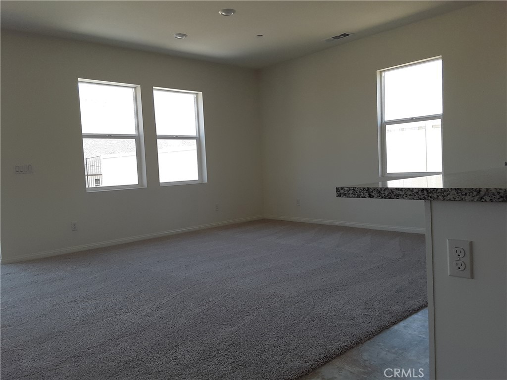 21108 Bison Mesa Road Riverside, CA 92507 - Photo 8 of 45 an empty room with a window