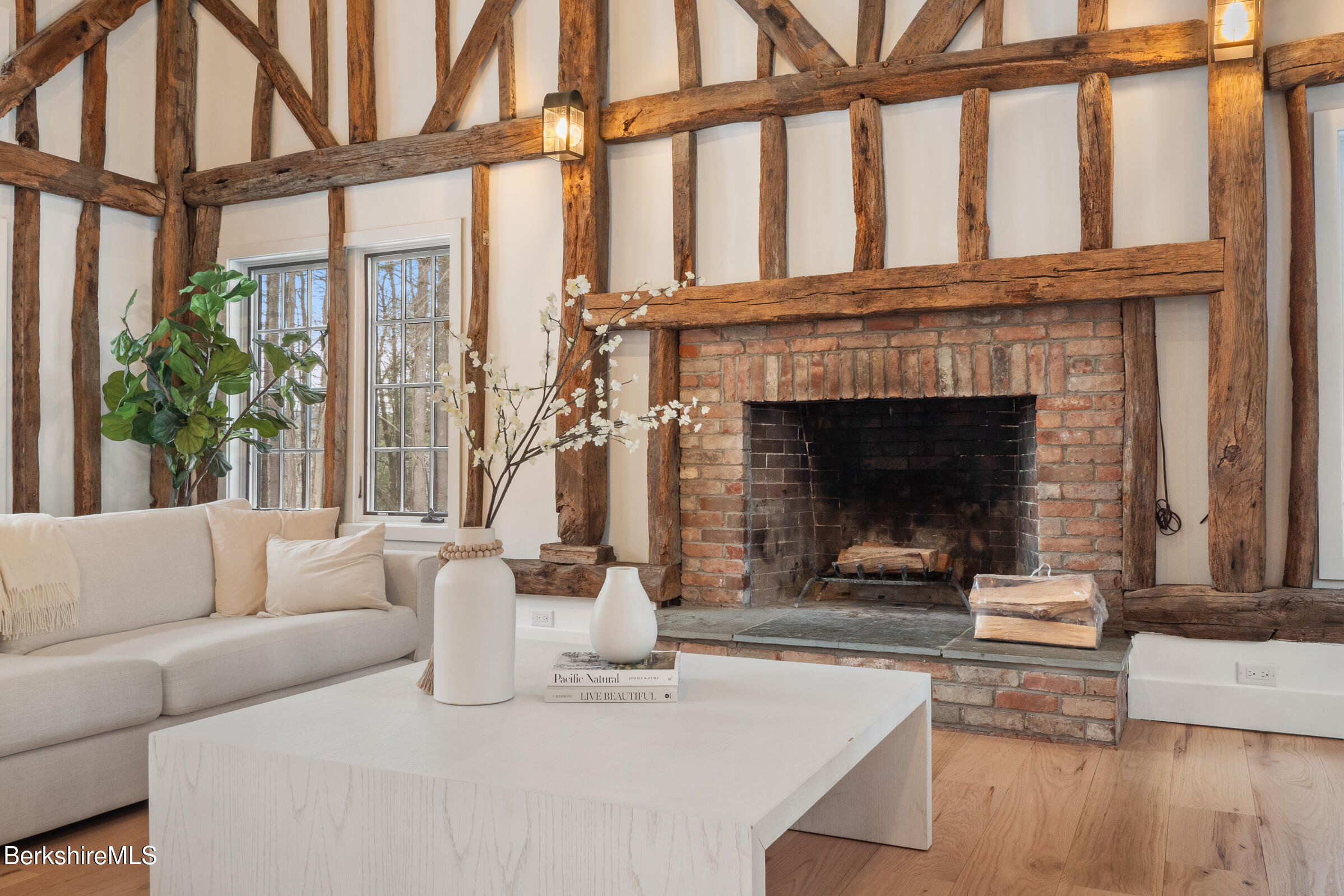 14 Pinecrest Cross Road Egremont, MA 01230 - Photo 2 of 40 a living room with furniture and a fireplace