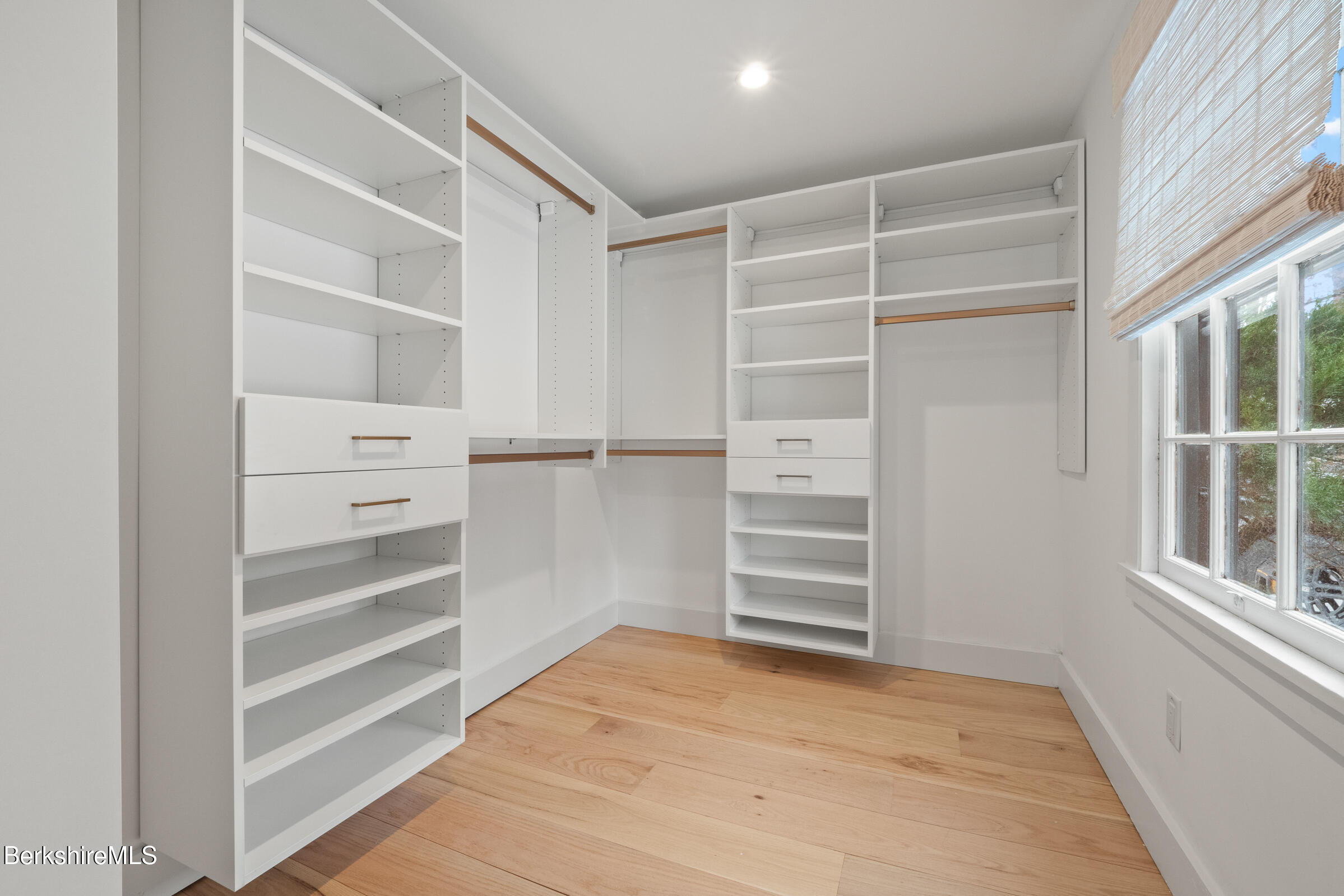 14 Pinecrest Cross Road Egremont, MA 01230 - Photo 23 of 40 a view of walk in closet with empty racks