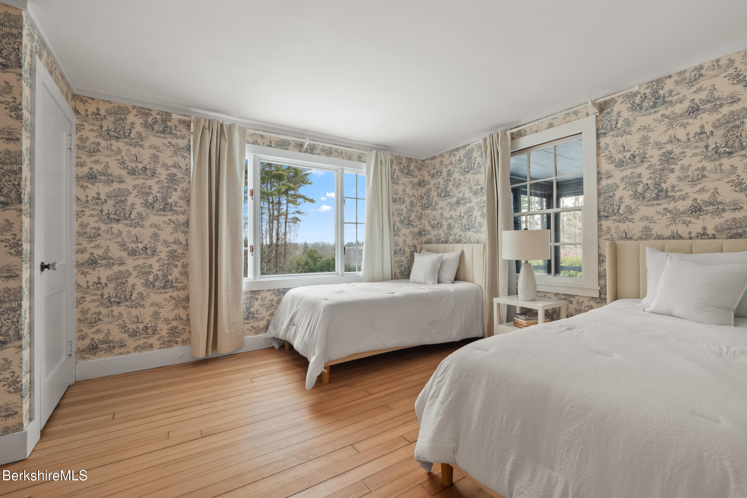 14 Pinecrest Cross Road Egremont, MA 01230 - Photo 24 of 40 a bedroom with two beds and wooden floor