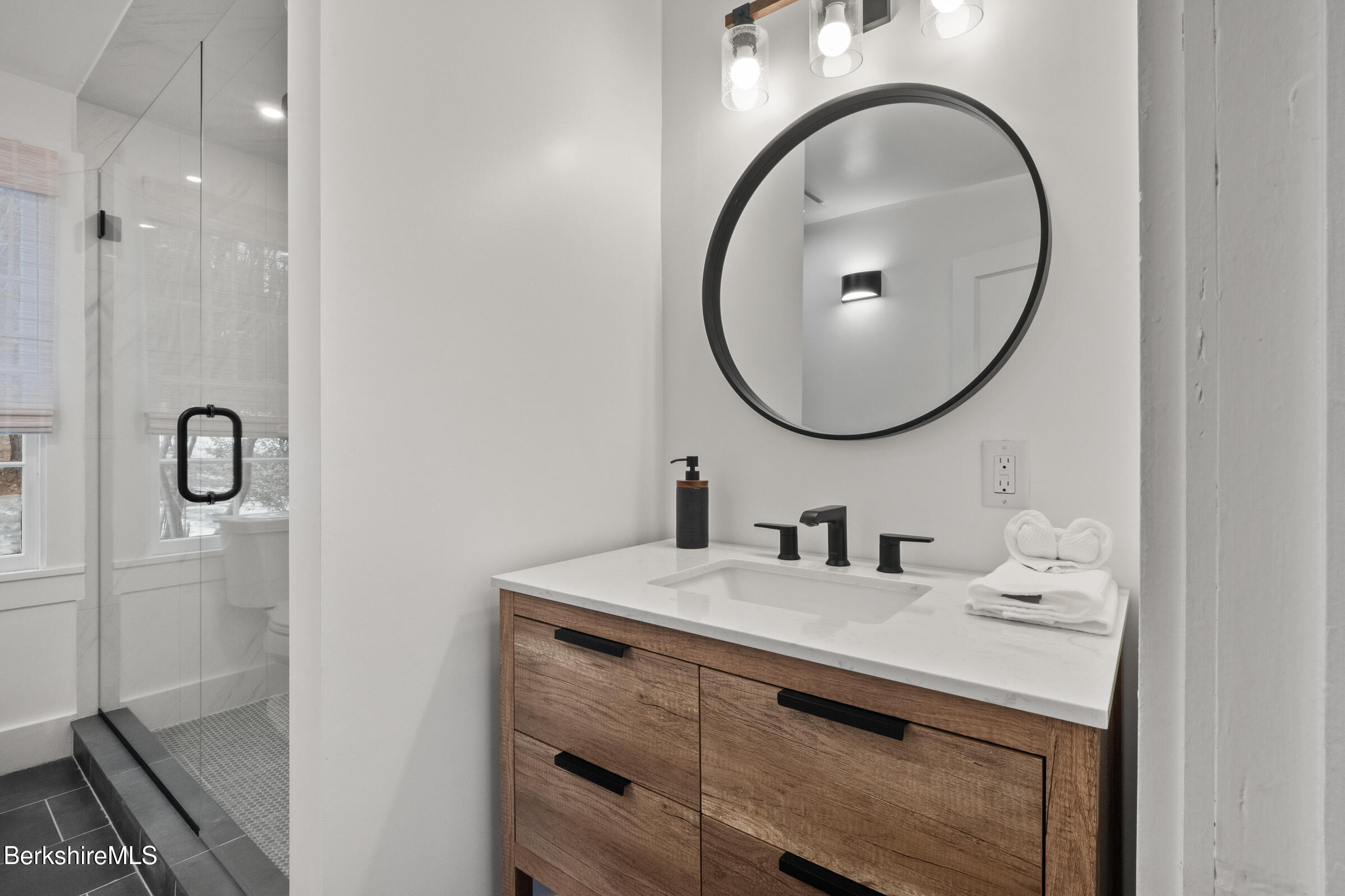 14 Pinecrest Cross Road Egremont, MA 01230 - Photo 25 of 40 a bathroom with a sink vanity and a mirror