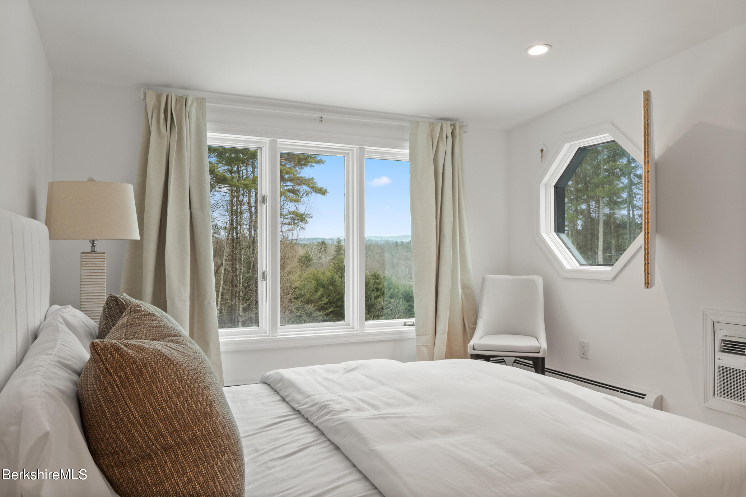 14 Pinecrest Cross Road Egremont, MA 01230 - Photo 33 of 40 a bedroom with a bed and a large window