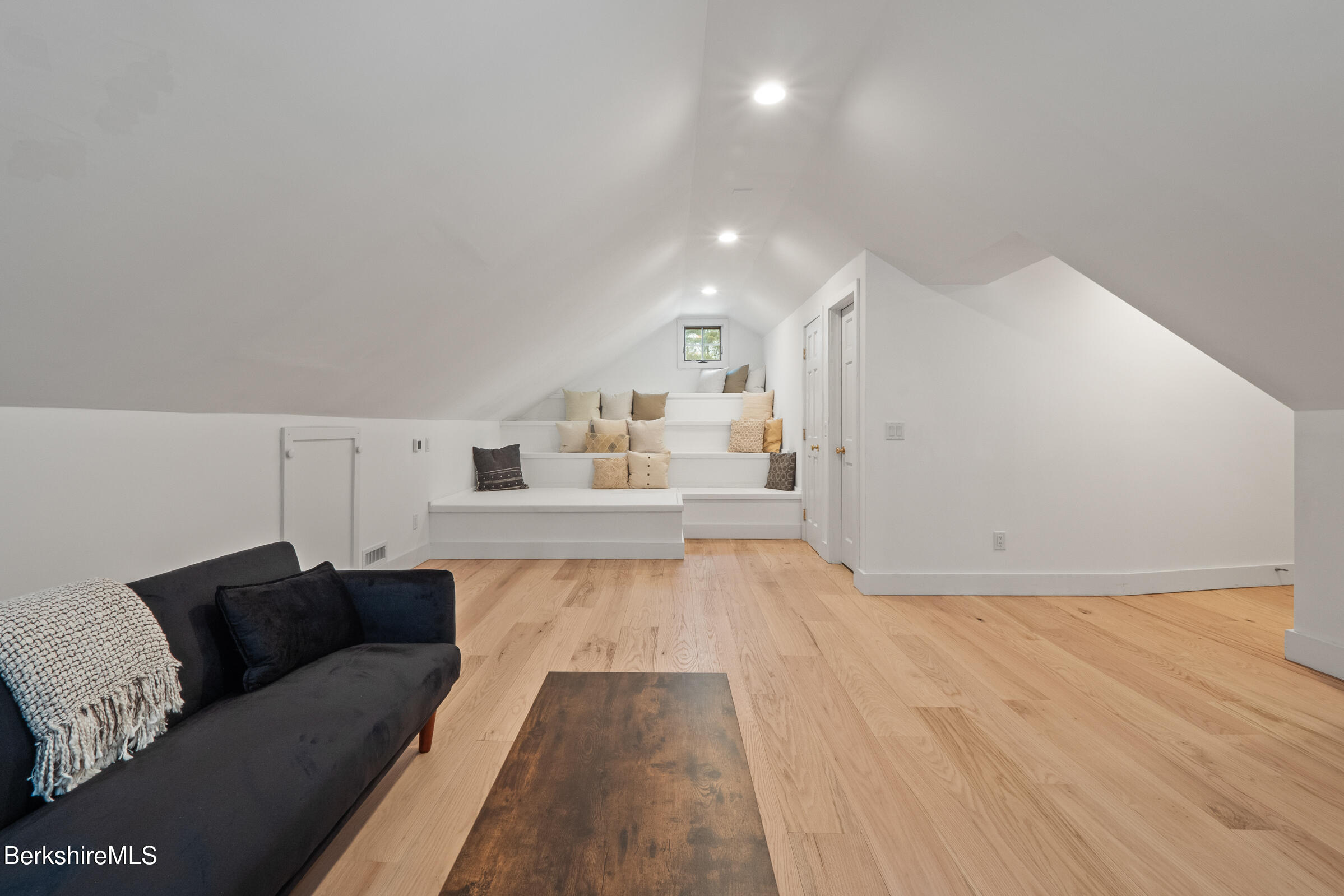 14 Pinecrest Cross Road Egremont, MA 01230 - Photo 35 of 40 a living room with furniture and a wooden floor
