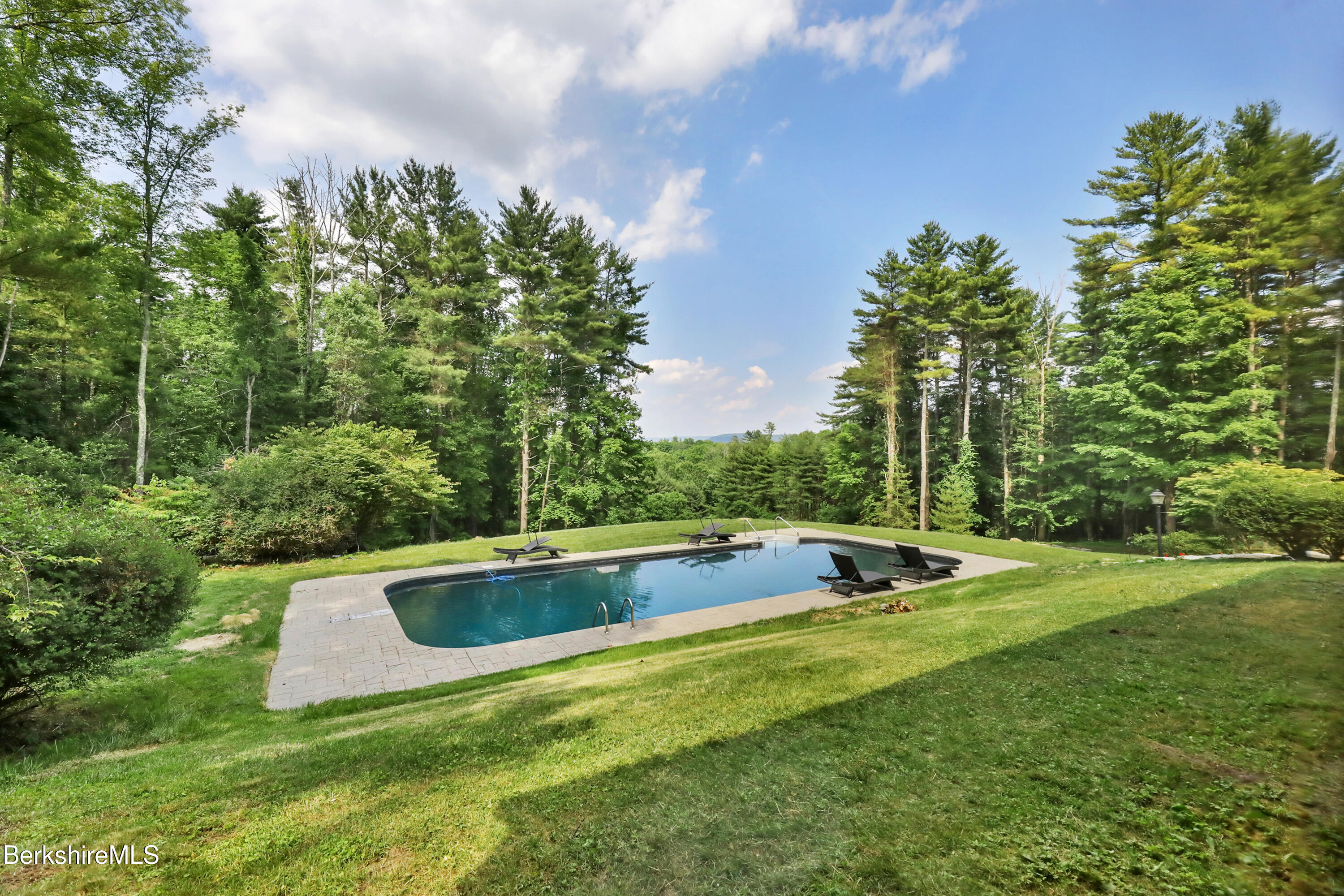 14 Pinecrest Cross Road Egremont, MA 01230 - Photo 38 of 40 a view of a swimming pool and a yard