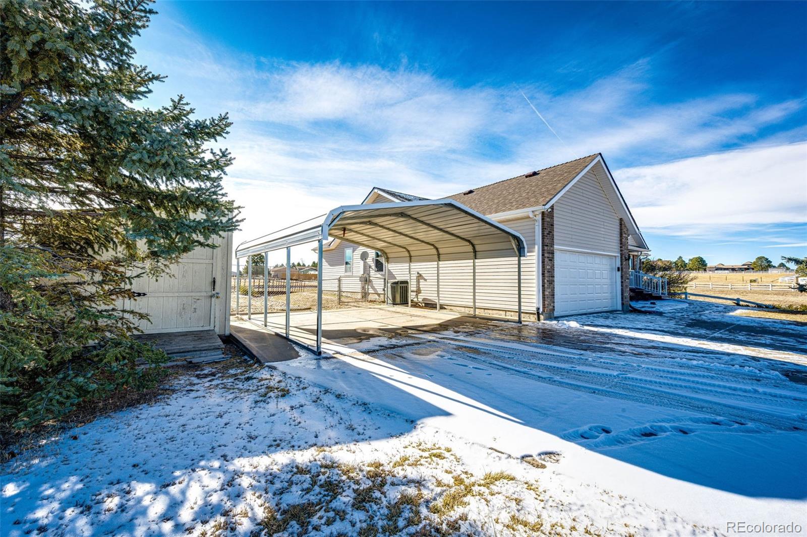 5672 Columbine Ridge Road Elizabeth, CO 80107 - Photo 11 of 50 a view of a house with backyard and garden