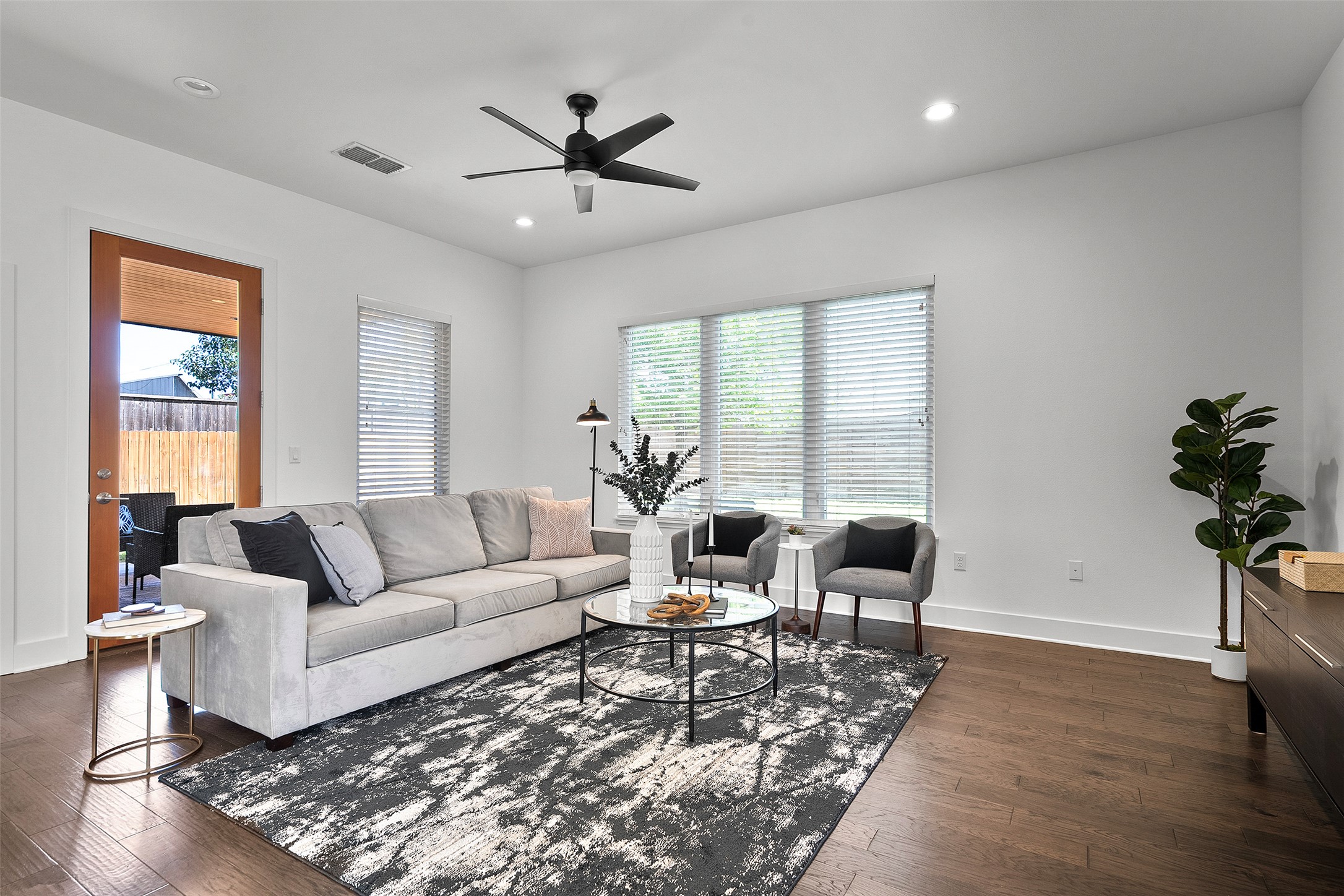 7813 Mullen Drive, Unit B Austin, TX 78757 - Photo 11 of 36 a living room with furniture or window and a wooden floor